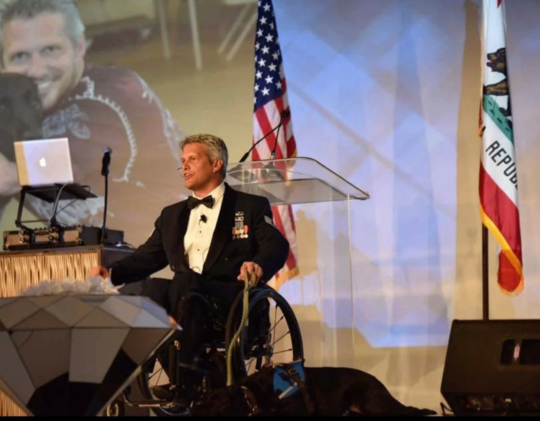 Jason speaking on stage